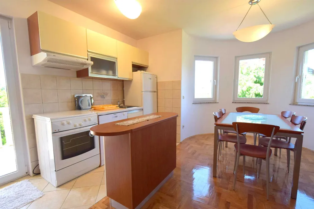 Two-Bedroom Apartment in Malinska for 4 Guests