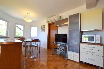 Two-Bedroom Apartment in Malinska for 4 Guests