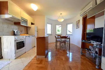 Two-Bedroom Apartment in Malinska for 4 Guests