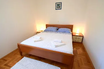 Two-Bedroom Apartment in Malinska for 4 Guests