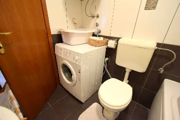 Two-Bedroom Apartment in Malinska for 4 Guests