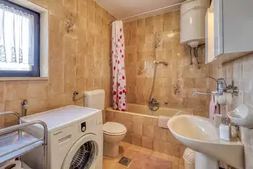 Two-Bedroom Apartment in Malinska for 4 Guests