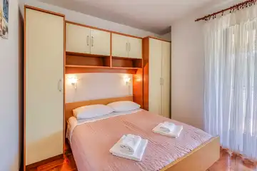 Two-Bedroom Apartment in Malinska for 4 Guests