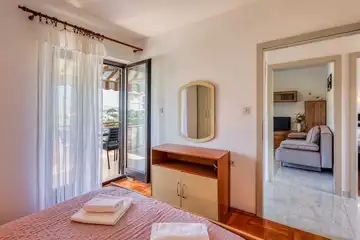 Two-Bedroom Apartment in Malinska for 4 Guests