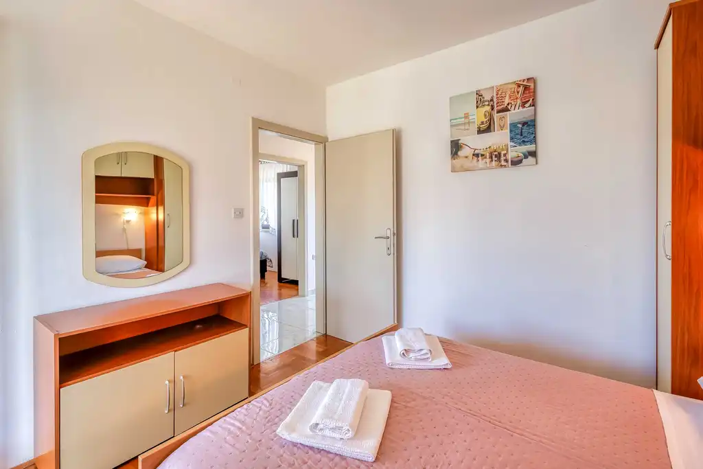 Two-Bedroom Apartment in Malinska for 4 Guests