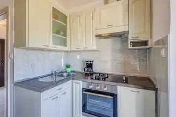 Two-Bedroom Apartment in Malinska for 4 Guests