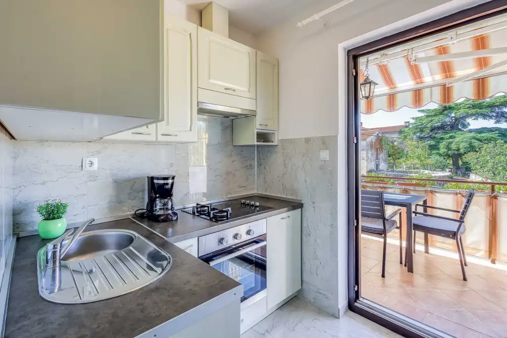 Two-Bedroom Apartment in Malinska for 4 Guests