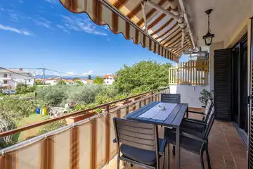 Two-Bedroom Apartment in Malinska for 4 Guests