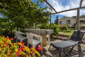 Two-Bedroom Apartment in Malinska for 4 Guests