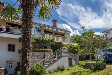 Two-Bedroom Apartment in Malinska for 4 Guests