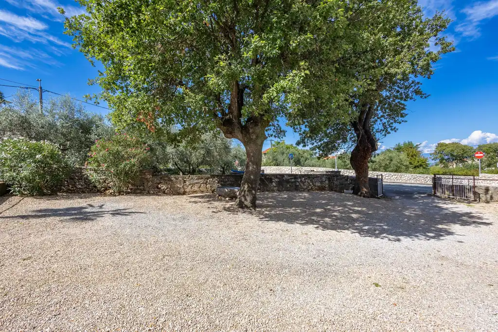 Two-Bedroom Apartment in Malinska for 4 Guests