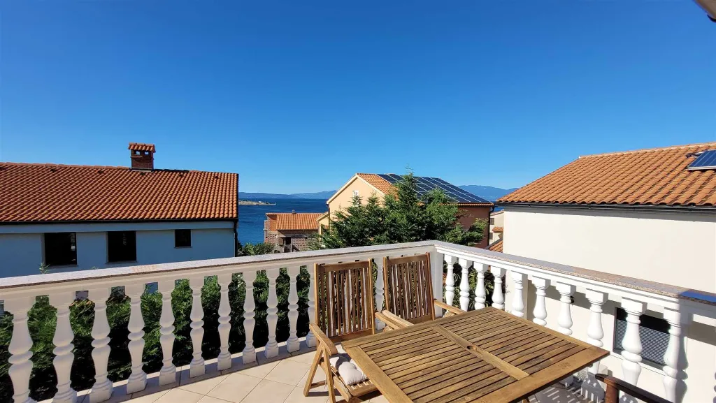 Two-Bedroom Apartment in Omisalj for 4 Guests