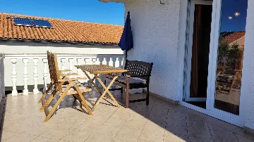 Two-Bedroom Apartment in Omisalj for 4 Guests