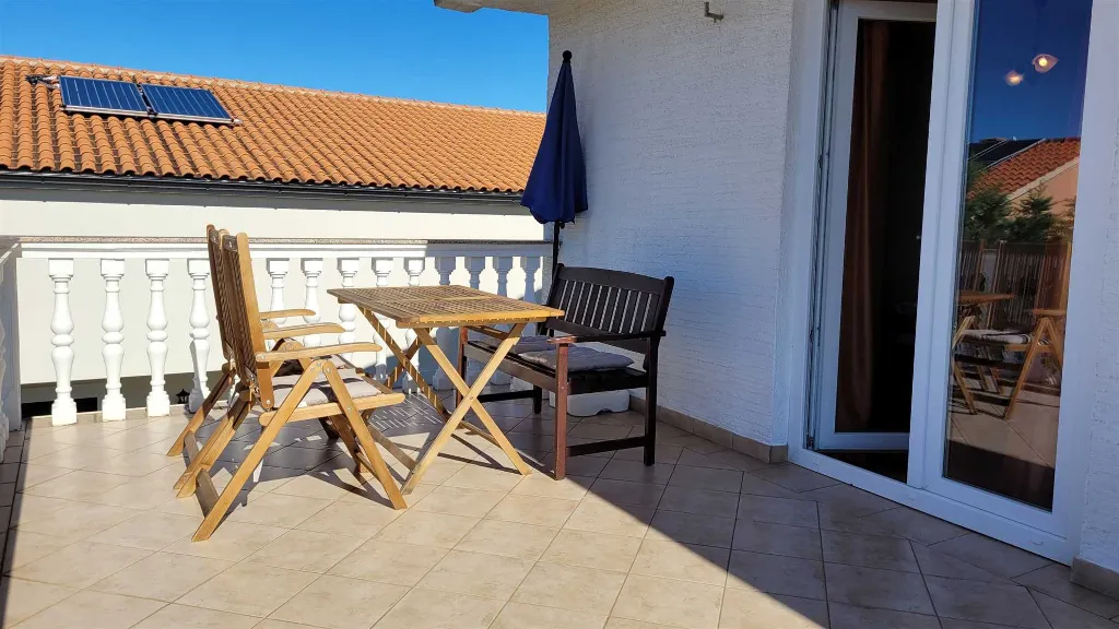 Two-Bedroom Apartment in Omisalj for 4 Guests