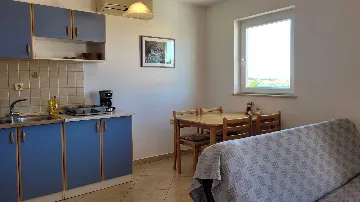 Two-Bedroom Apartment in Omisalj for 4 Guests
