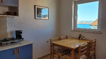 Two-Bedroom Apartment in Omisalj for 4 Guests