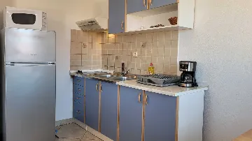 Two-Bedroom Apartment in Omisalj for 4 Guests
