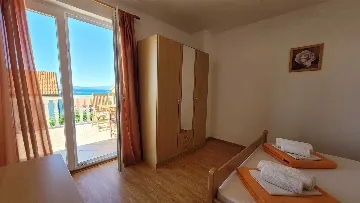 Two-Bedroom Apartment in Omisalj for 4 Guests