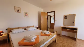 Two-Bedroom Apartment in Omisalj for 4 Guests