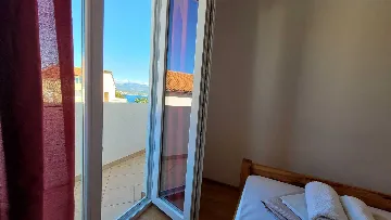 Two-Bedroom Apartment in Omisalj for 4 Guests