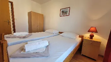 Two-Bedroom Apartment in Omisalj for 4 Guests