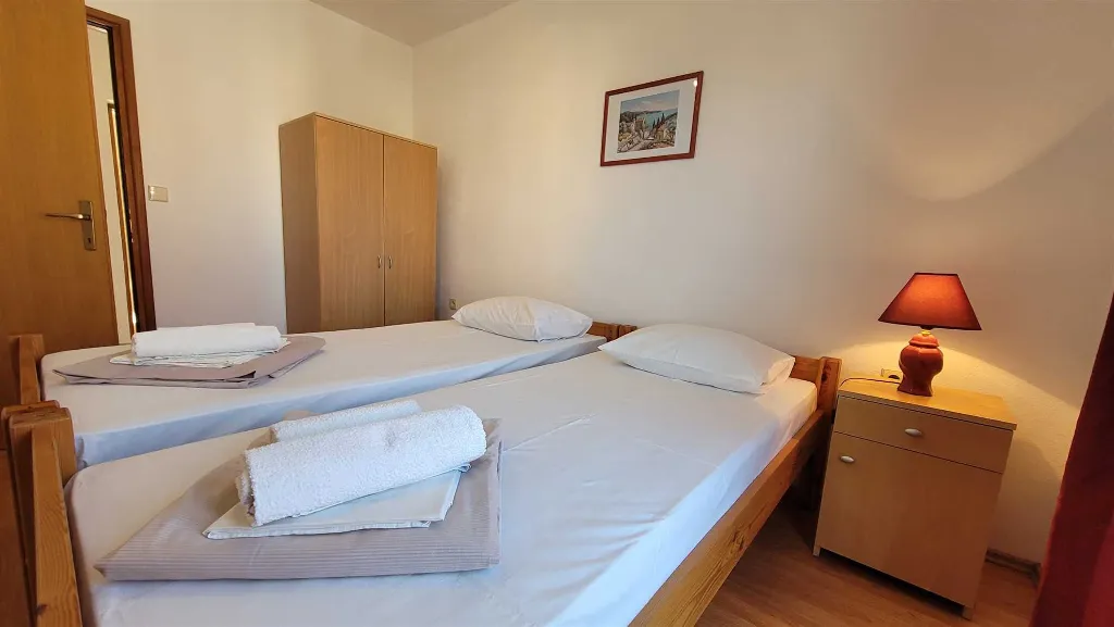 Two-Bedroom Apartment in Omisalj for 4 Guests