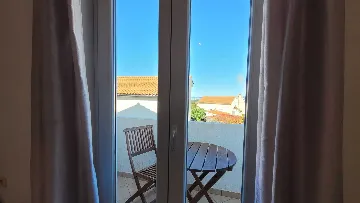 Apartment for 3 Guests with Balconies in Omisalj