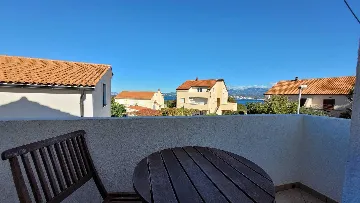 Apartment for 3 Guests with Balconies in Omisalj