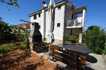 Two-Bedroom Apartment in Njivice for 6 Guests