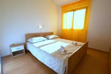 Two-Bedroom Apartment in Njivice for 6 Guests