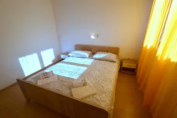 Two-Bedroom Apartment in Njivice for 6 Guests