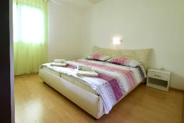 Two-Bedroom Apartment in Njivice for 6 Guests