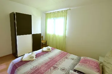 Two-Bedroom Apartment in Njivice for 6 Guests