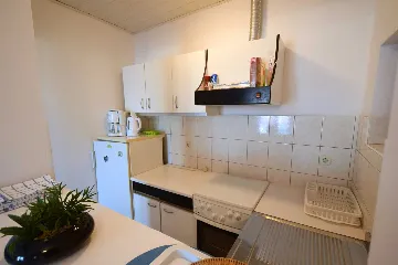 Two-Bedroom Apartment in Njivice for 6 Guests