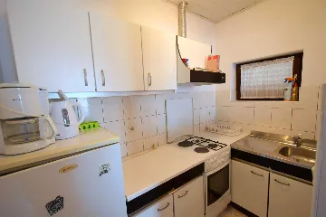 Two-Bedroom Apartment in Njivice for 6 Guests