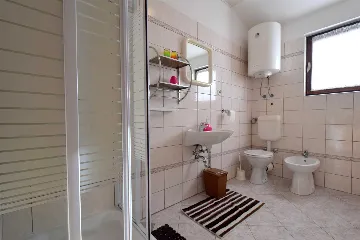 Two-Bedroom Apartment in Njivice for 6 Guests