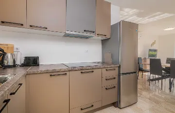 Ground-Floor Apartment in Malinska for 6 Guests