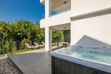 Apartment in Njivice with Private Garden & Hot Tub