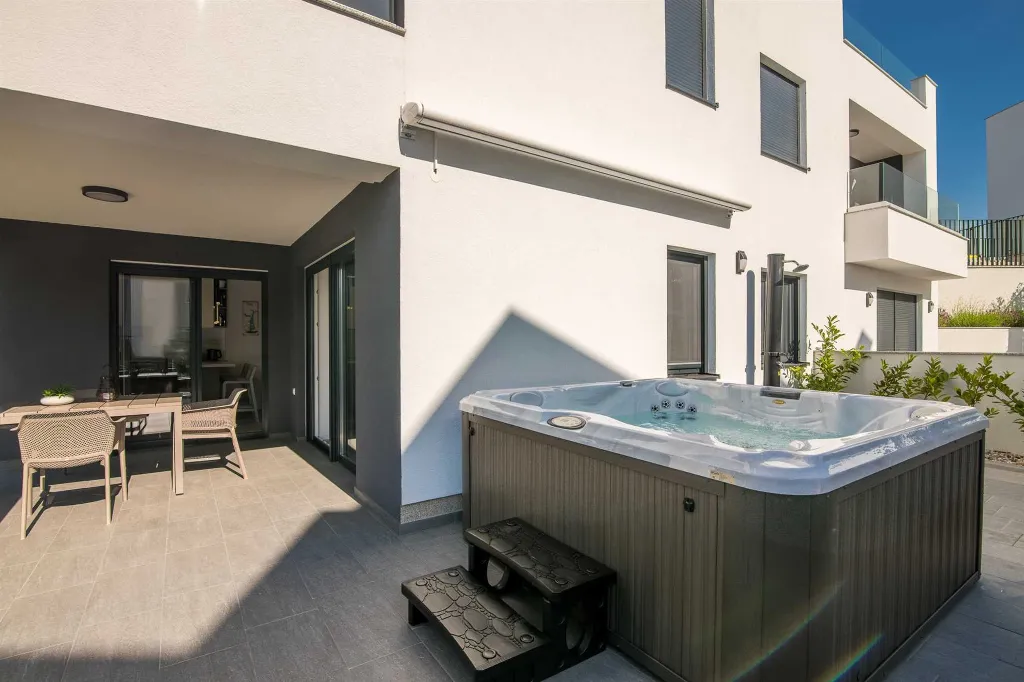 Apartment in Njivice with Private Garden & Hot Tub