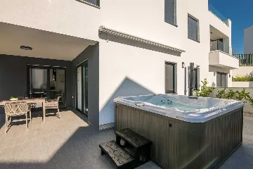 Apartment in Njivice with Private Garden & Hot Tub