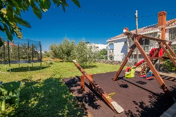 Two-Bedroom Apartment in Porat with Garden and Parking