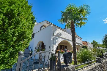 Two-Bedroom Apartment in Malinska for 4 Guests