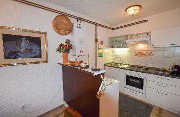 Two-Bedroom Apartment in Malinska for 4 Guests