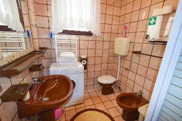 Two-Bedroom Apartment in Malinska for 4 Guests