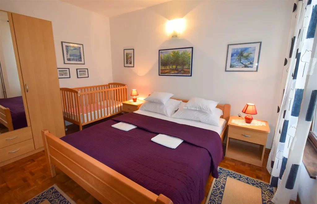 Two-Bedroom Apartment in Malinska for 4 Guests