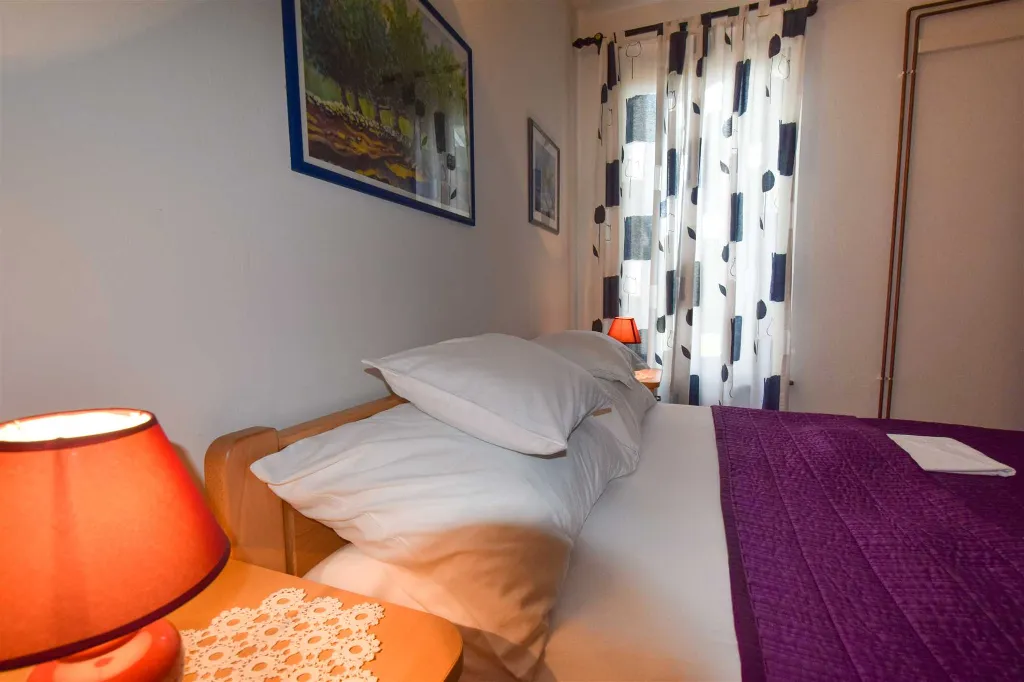 Two-Bedroom Apartment in Malinska for 4 Guests