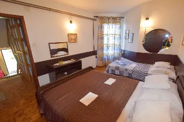 Two-Bedroom Apartment in Malinska for 4 Guests