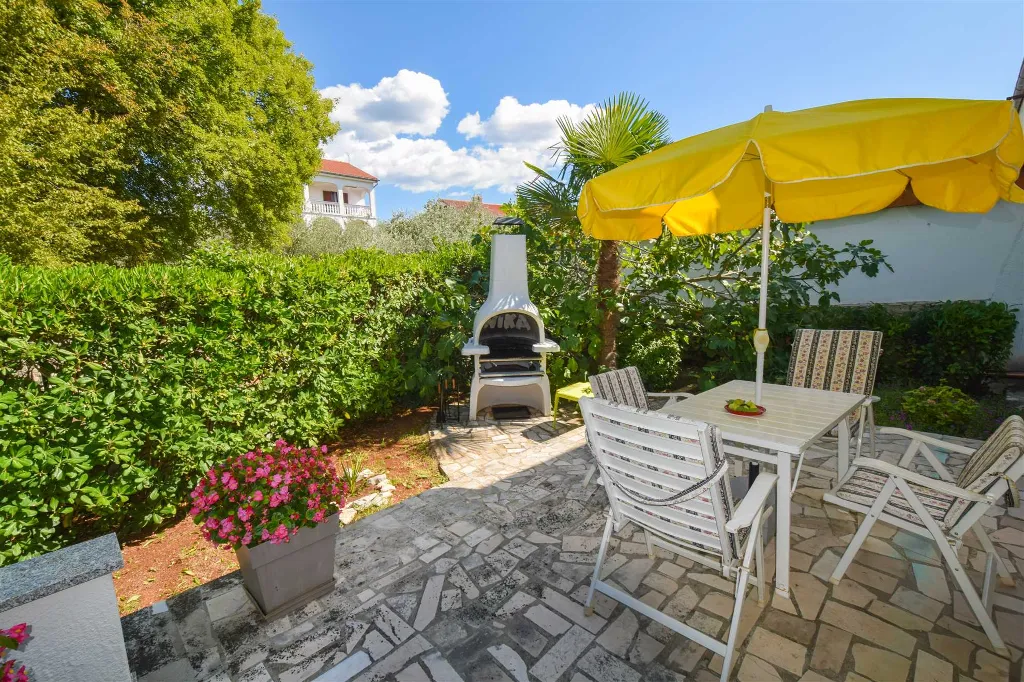 Two-Bedroom Apartment in Malinska for 4 Guests