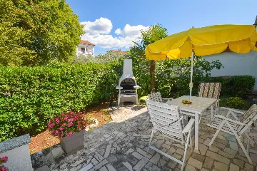 Two-Bedroom Apartment in Malinska for 4 Guests