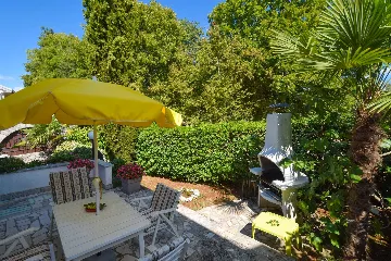 Two-Bedroom Apartment in Malinska for 4 Guests